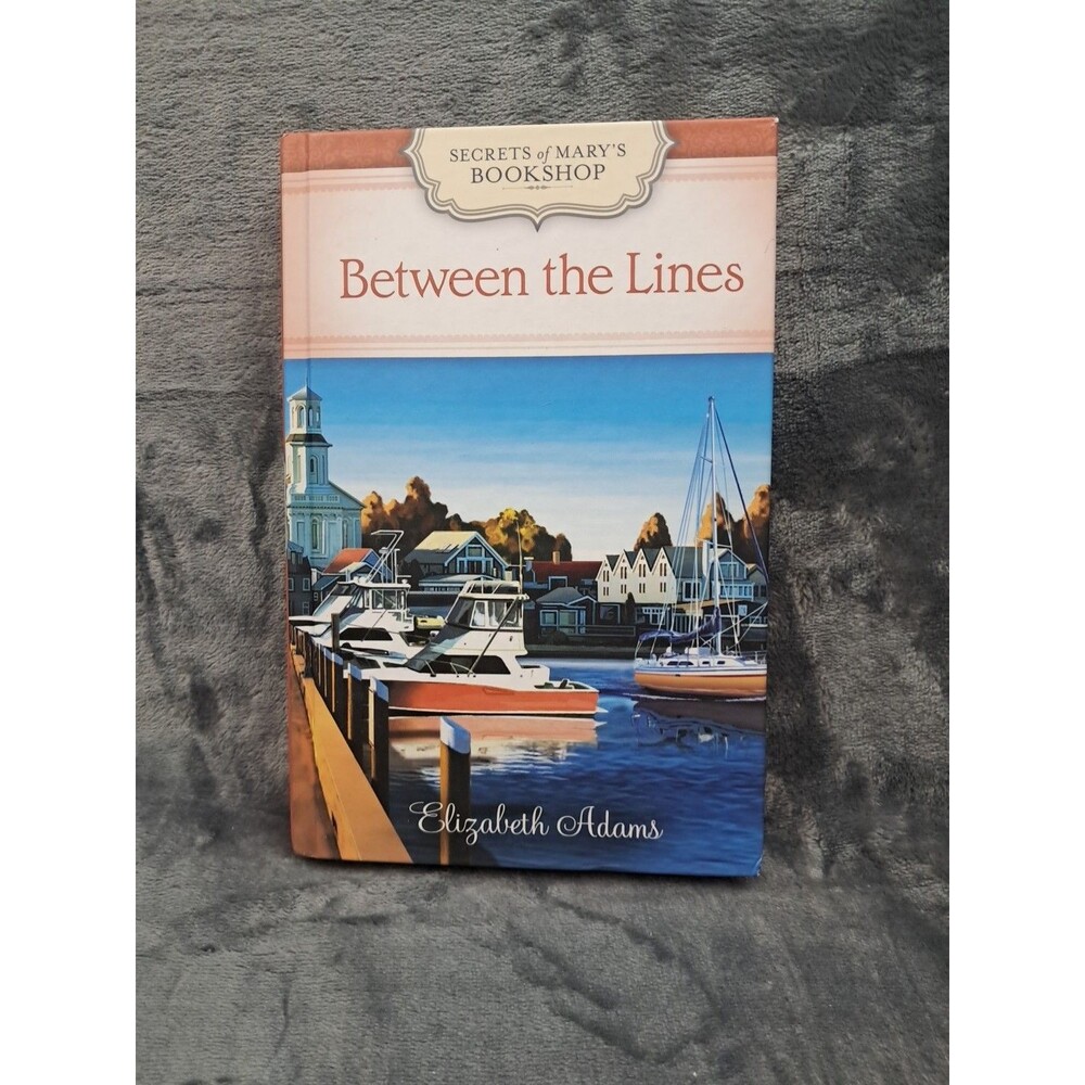 Between the LInes     Secrets of Mary's bookshop    Elizabeth Adams  HC